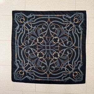 Elegant Black and Gold Patterned Scarf